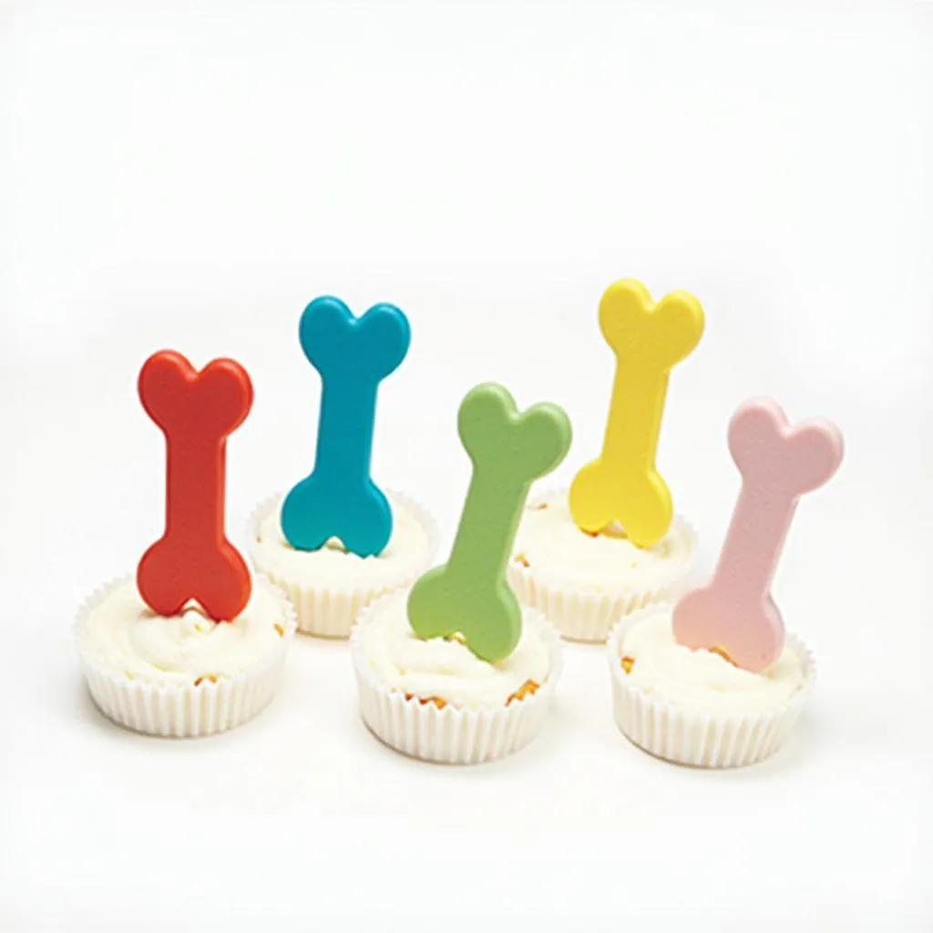 Bone-shaped cupcake toppers for dog birthday parties