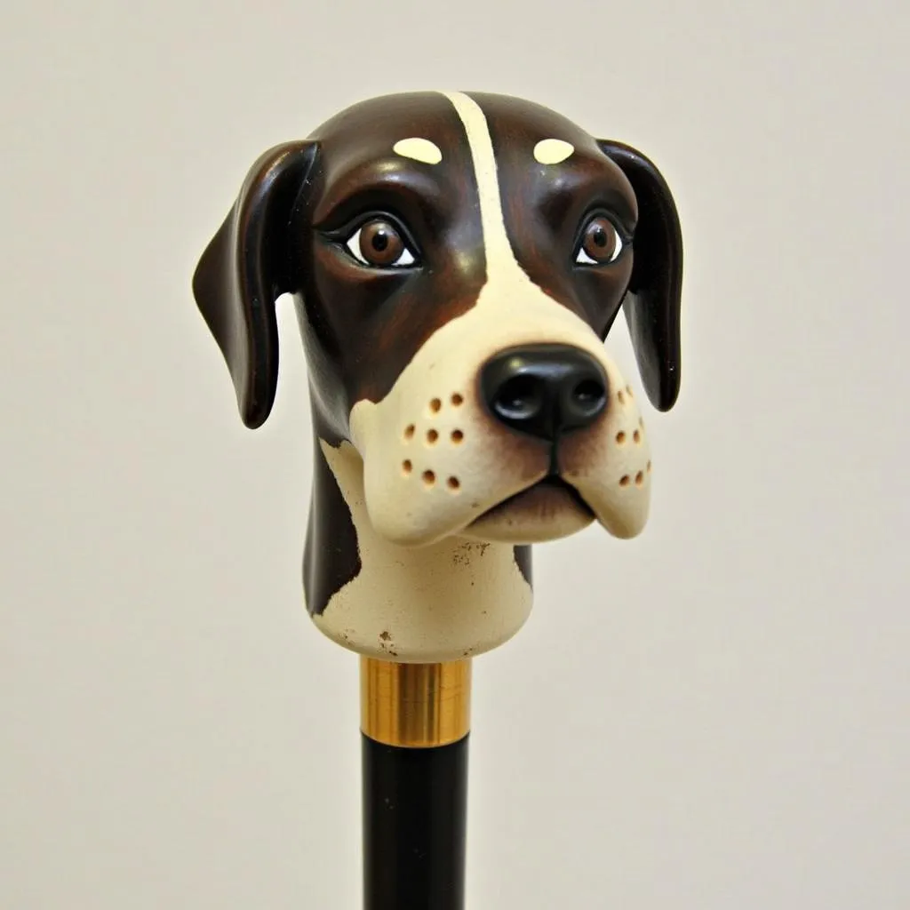 A dog head walking stick for sale