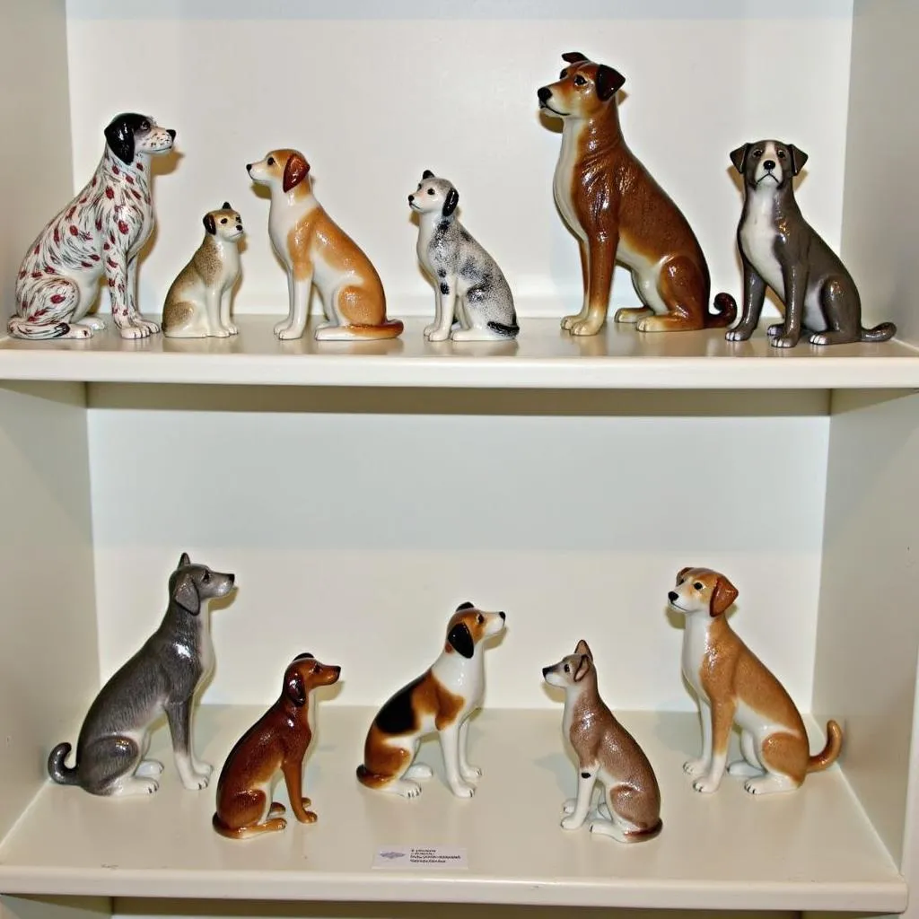 Herend dog figurines, a collection of hand-painted porcelain figures